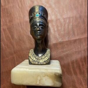 Vintage Nefertiti bronze statue on stone base Egypt